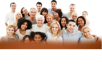 A group of of people ( men, women, and children ) of all ages, standing close together for a group picture.